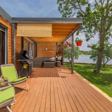 Holiday home Strandhaus Ive: Beachfront Oasis With Whirlpool And Olive Grove *
