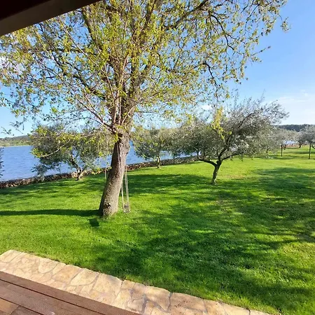 Holiday home Strandhaus Ive: Beachfront Oasis With Whirlpool And Olive Grove Pula